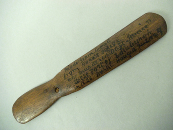 Souvenir letter opener, made from wood taken from Hare's house. 